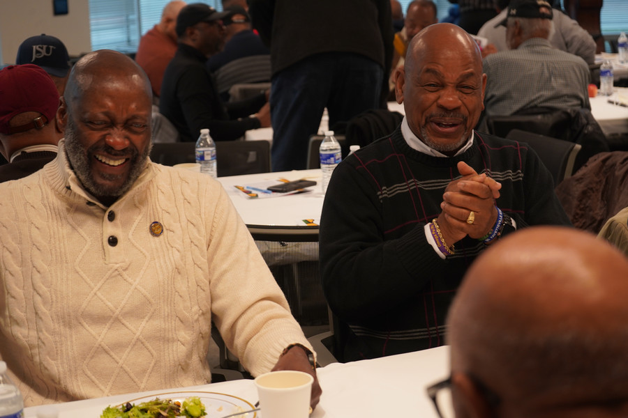 Men eating at a table 