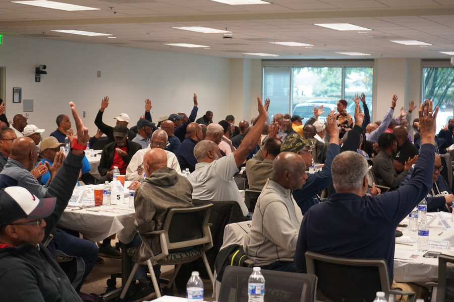 Men raising their hands