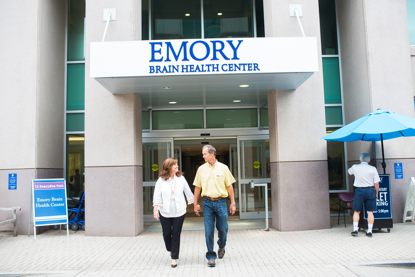 couple exiting Emory's brain health center